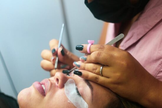 professional eyelash extension application in salon